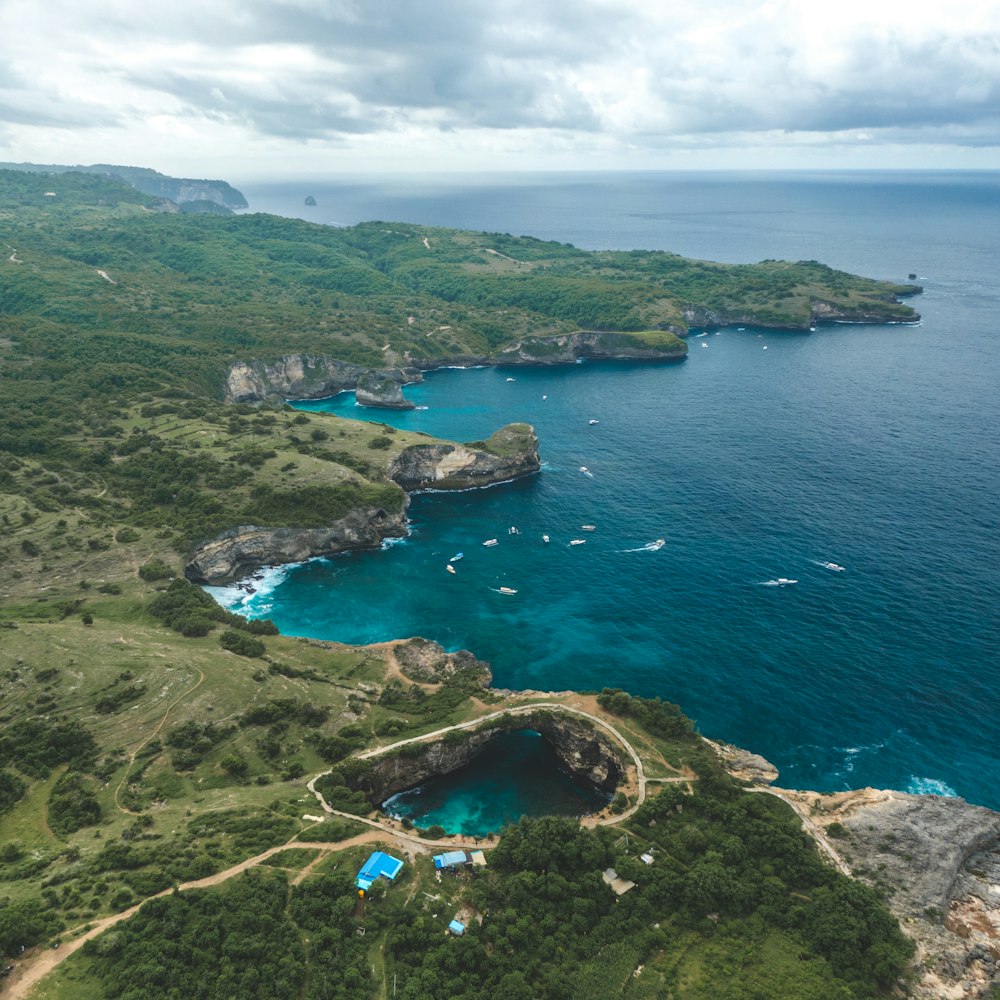 an aerial view of a body of water surrounded by land