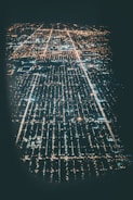 An aerial view of a city with smart grid infrastructure.