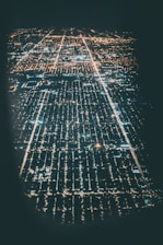 An aerial view of a city with smart grid infrastructure.