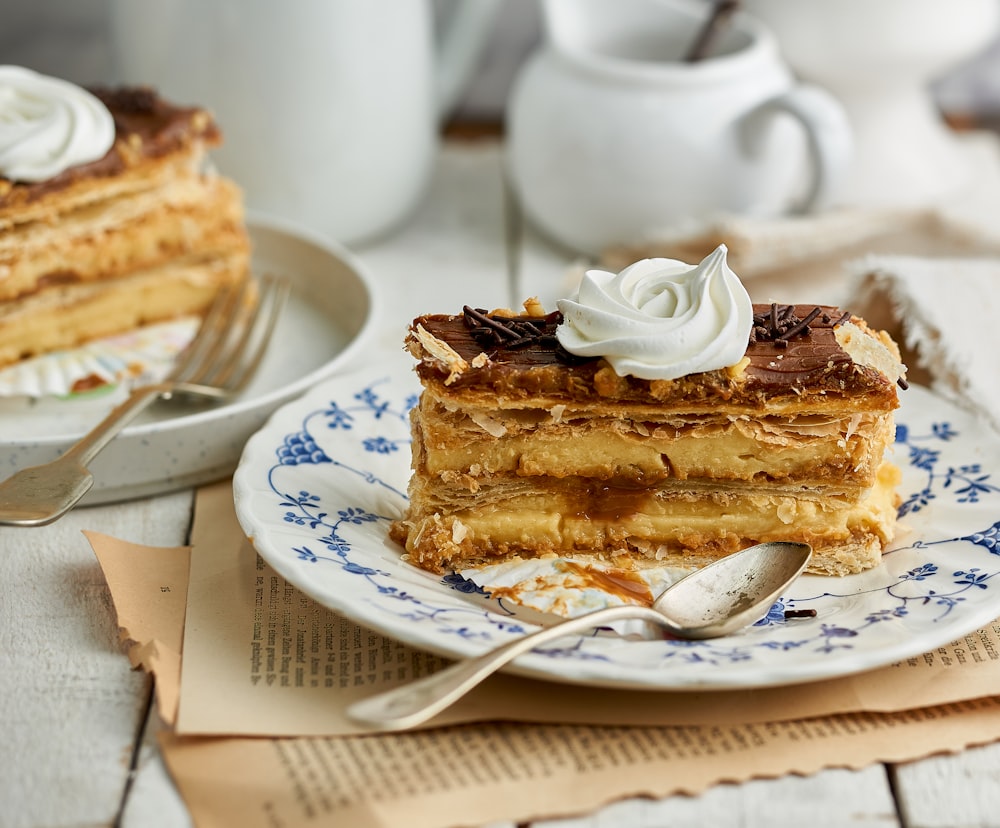 a piece of cake sitting on top of a blue and white plate