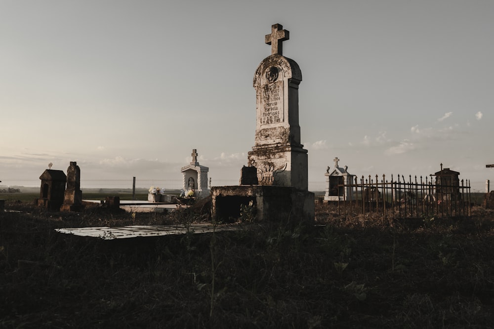 a cemetery with a cross on top of it