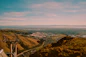 a view of a city from a mountain top