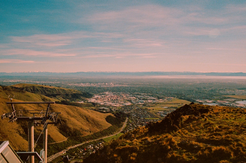 a view of a city from a mountain top