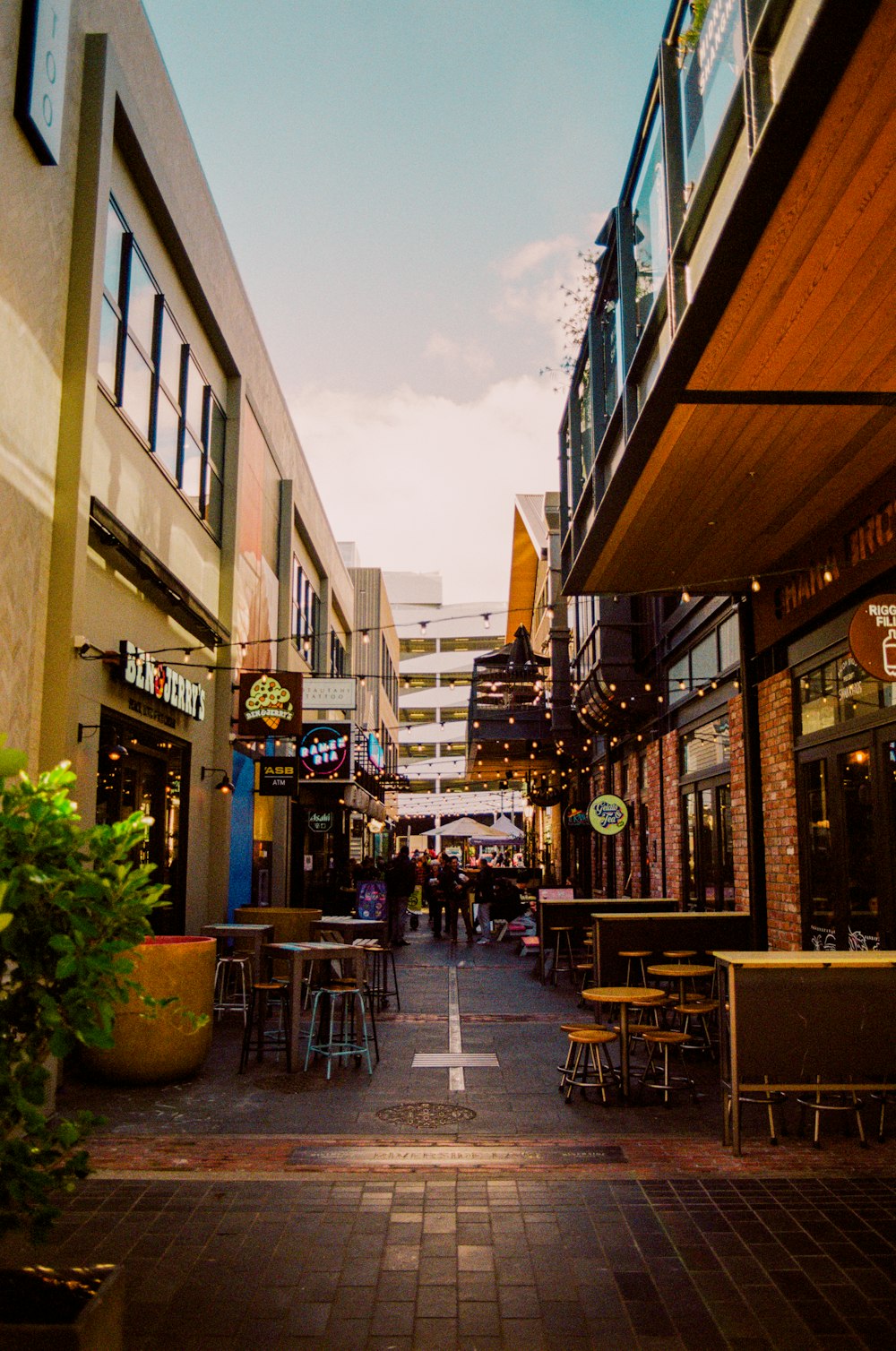 a city street lined with tables and chairs