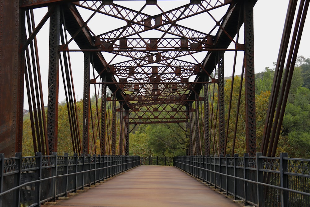 a bridge that has a metal structure on it