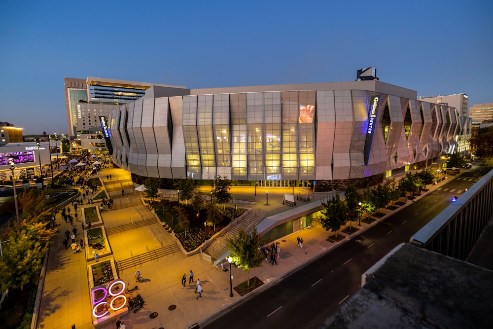 an aerial view of a modern building at night