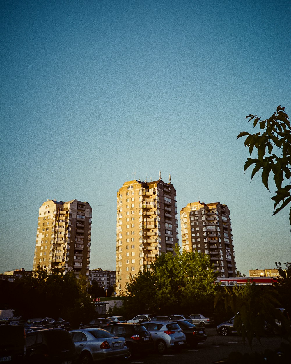 a group of tall buildings sitting next to each other