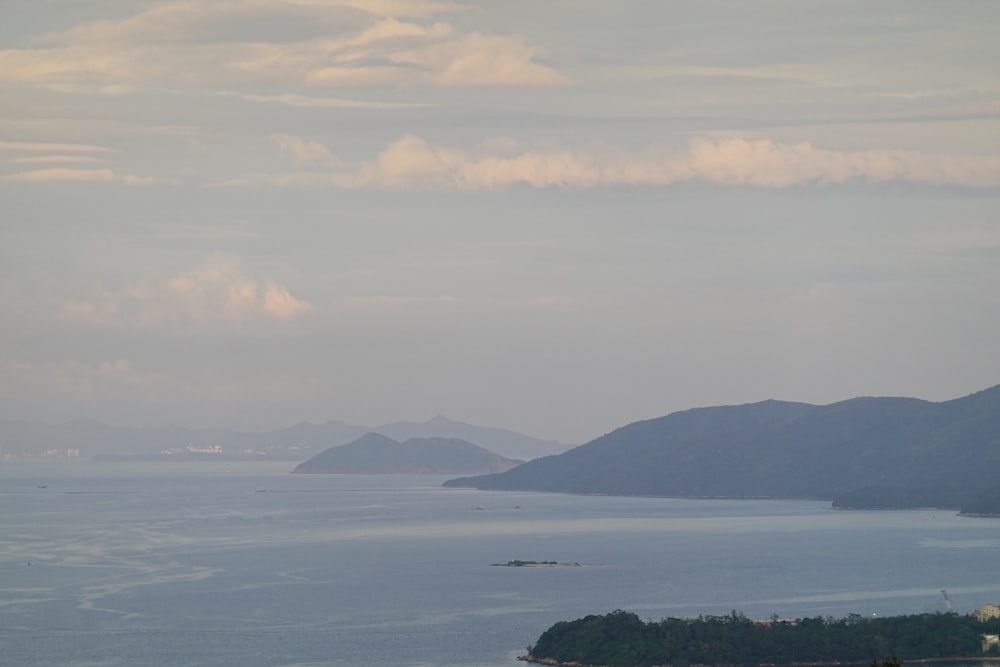 a large body of water surrounded by mountains