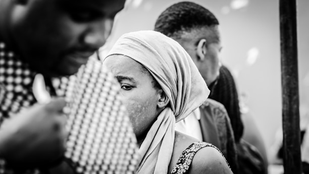 A striking black-and-white photograph capturing a moment of daily life in Sudan.