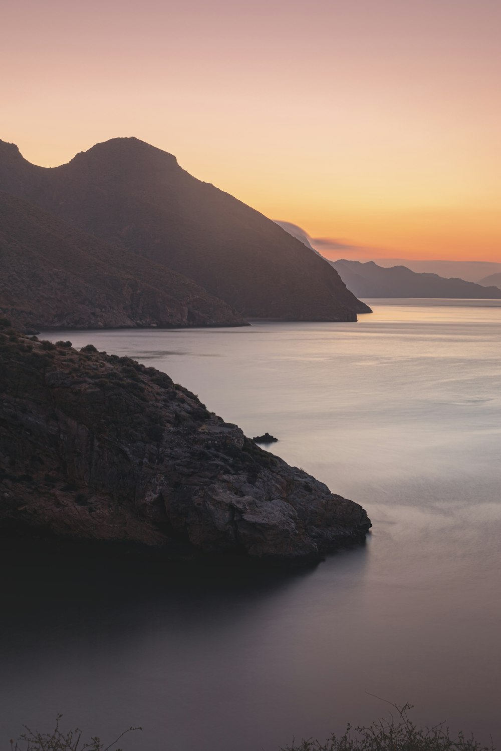 a large body of water surrounded by mountains