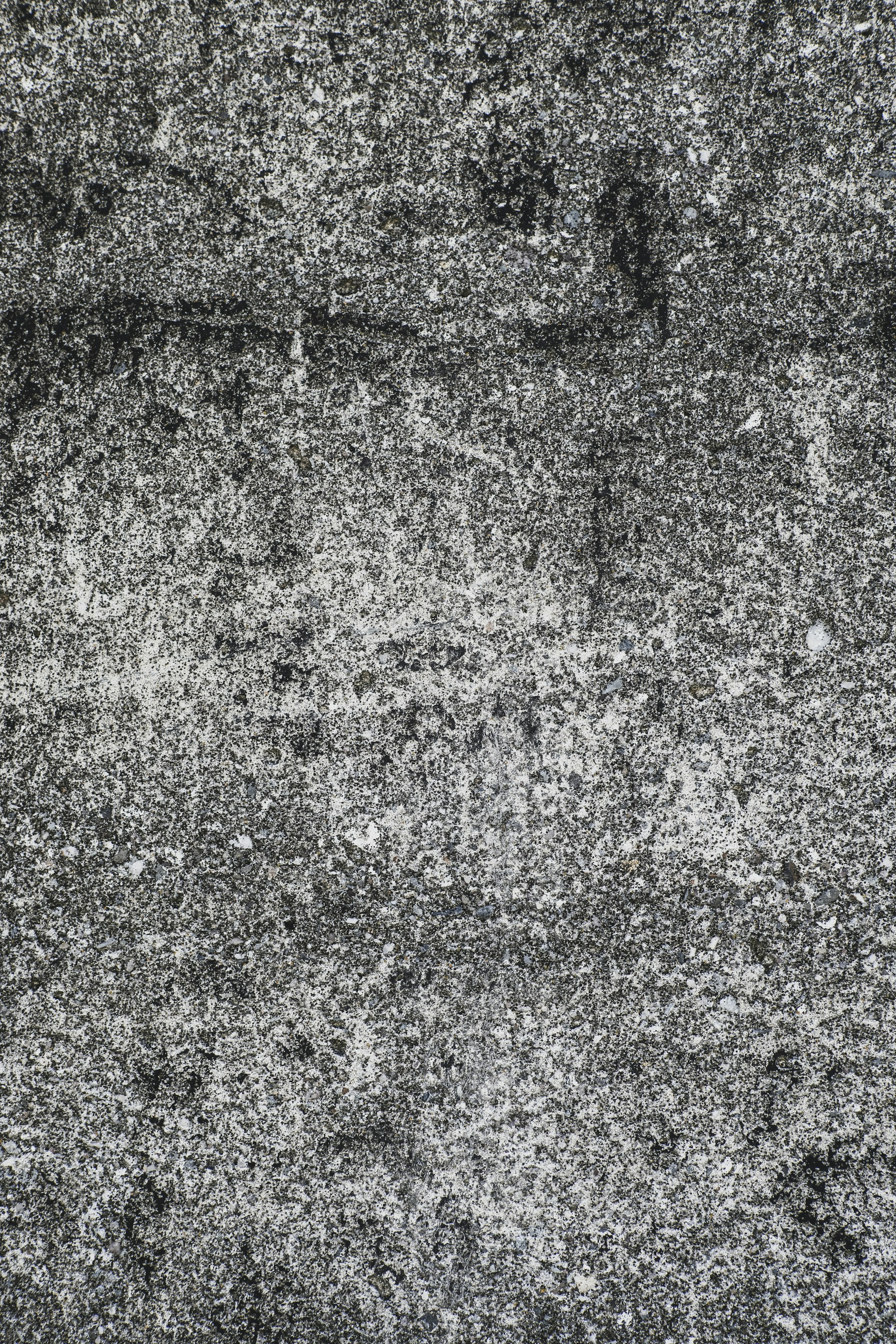 a black and white photo of a textured surface