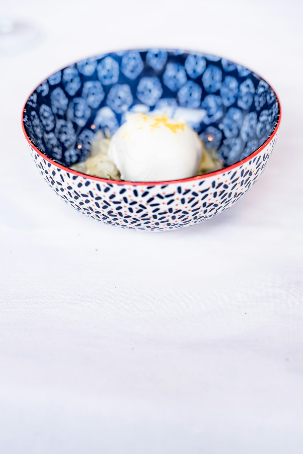 a blue bowl on a table