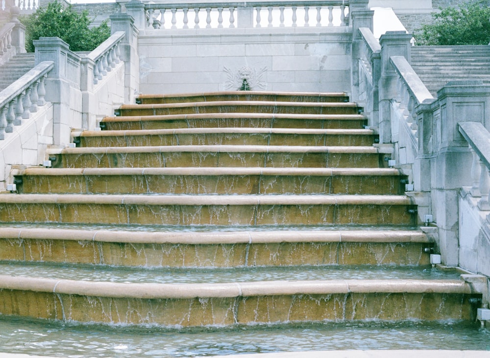 a bunch of steps that have water running down them