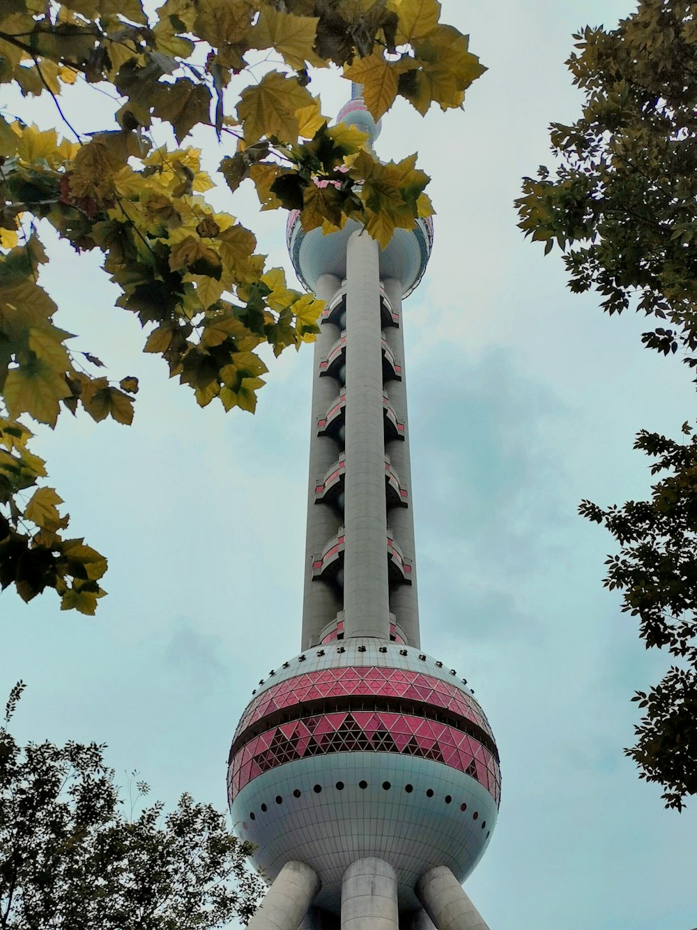 a tall tower with a clock on the top of it