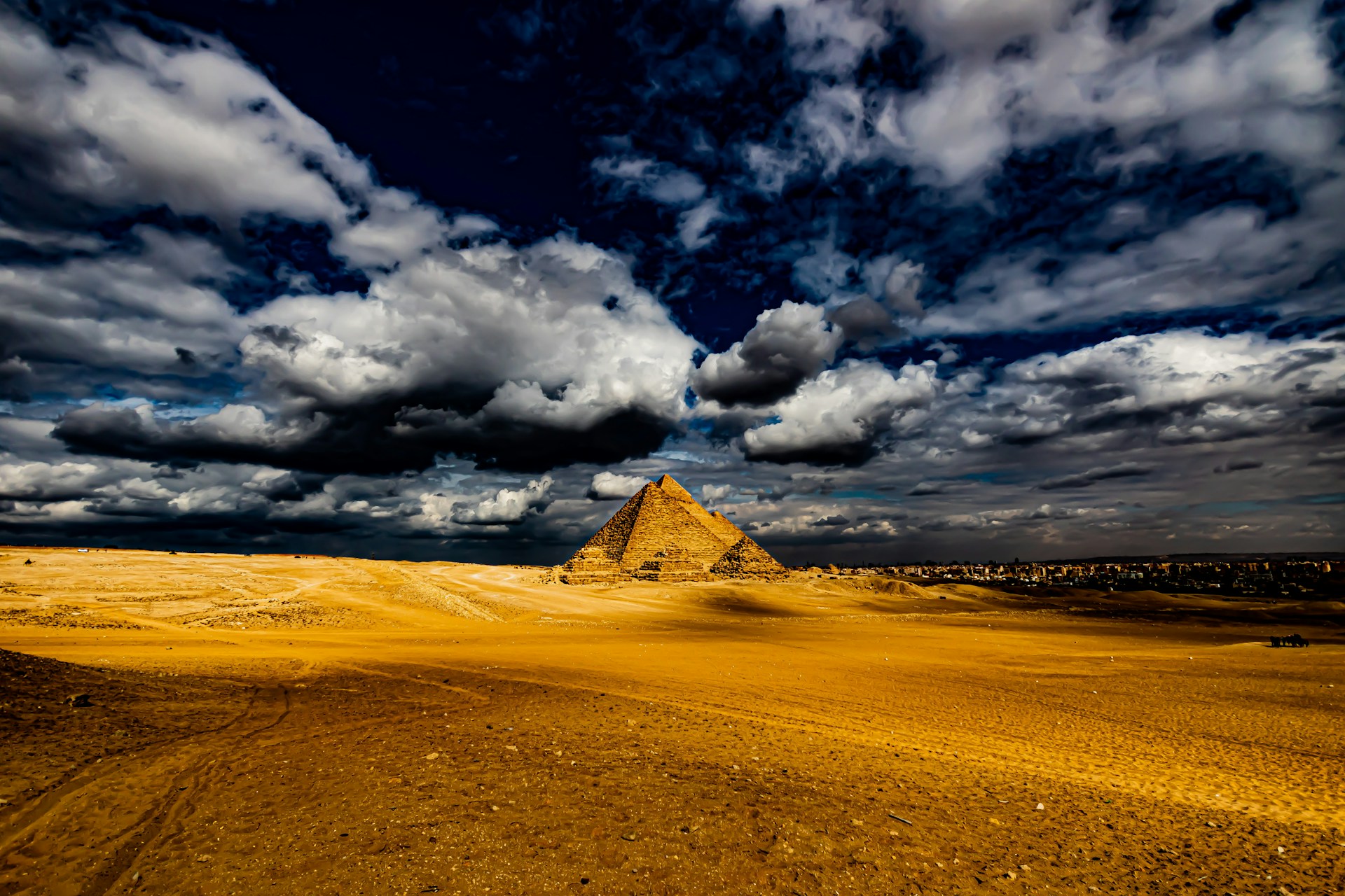 a large pyramid in the middle of a desert
