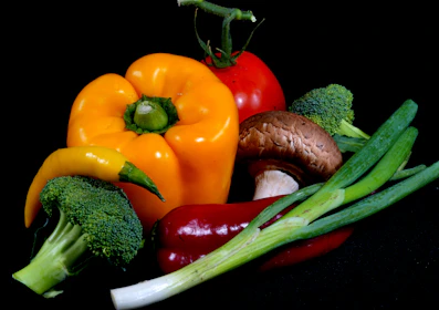 a group of vegetables sitting next to each other