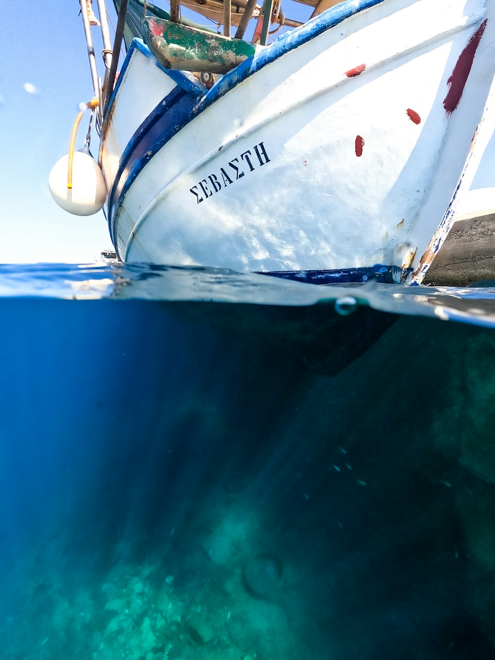 a boat in the water with a sky background