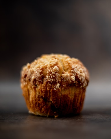 a close up of a muffin on a table