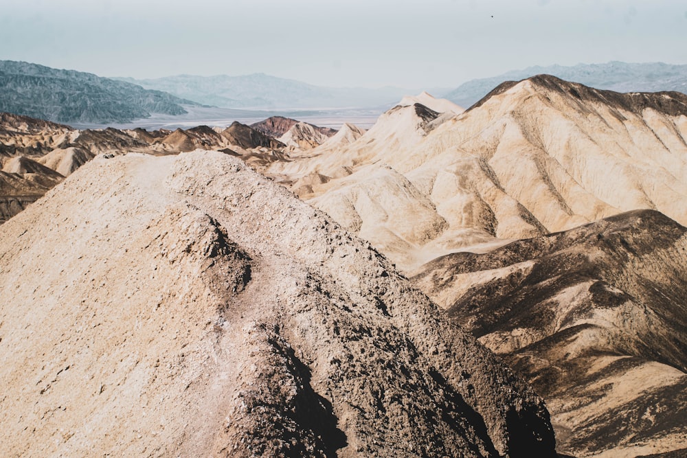 a view of a mountain range in the desert