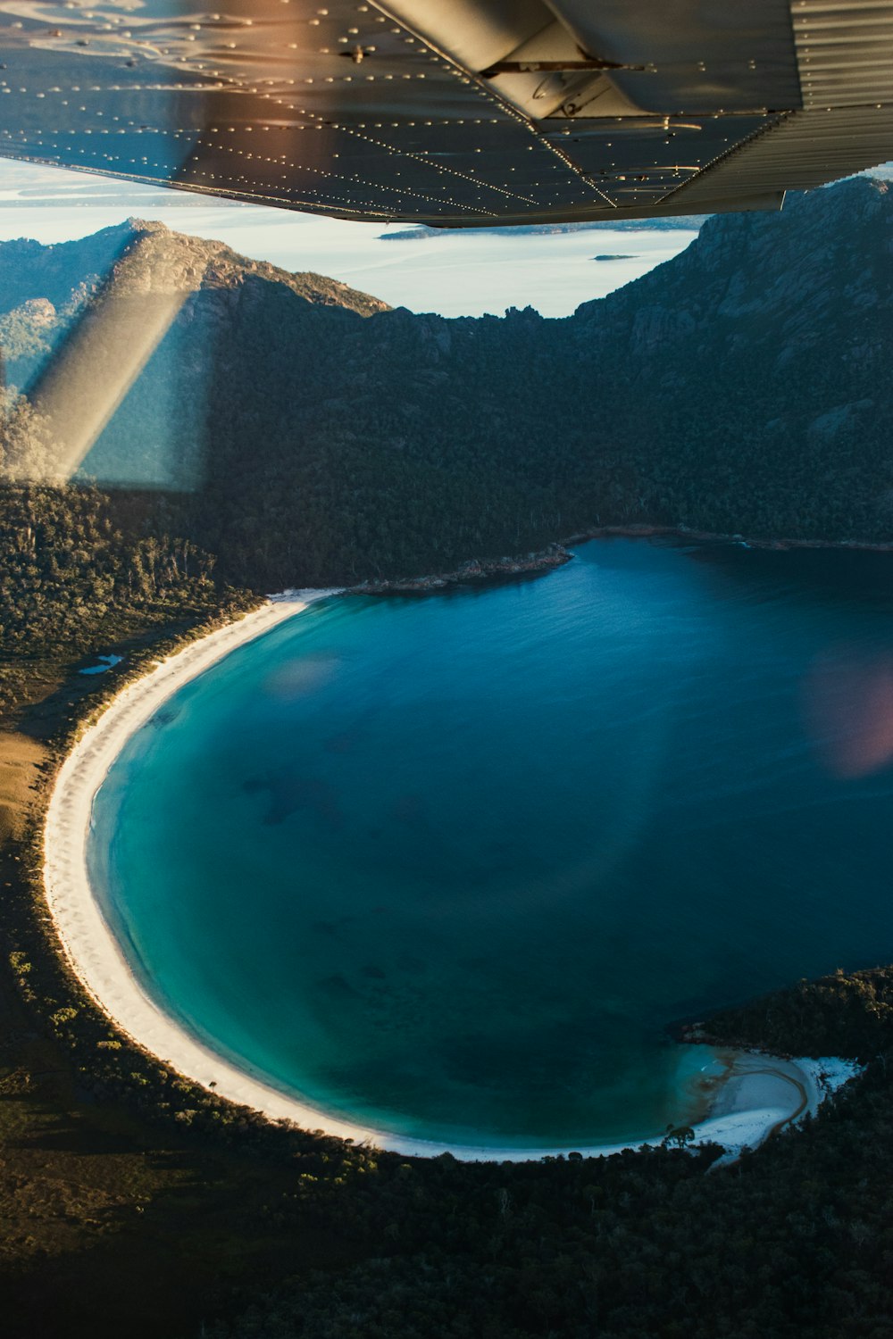 a large body of water surrounded by mountains