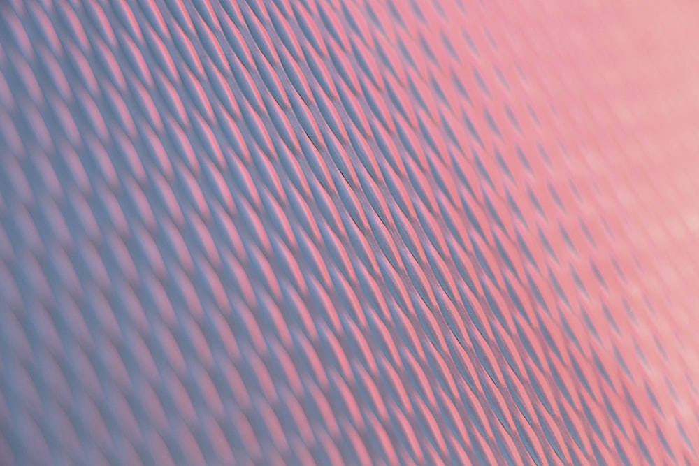 a blurry image of a pink and blue background