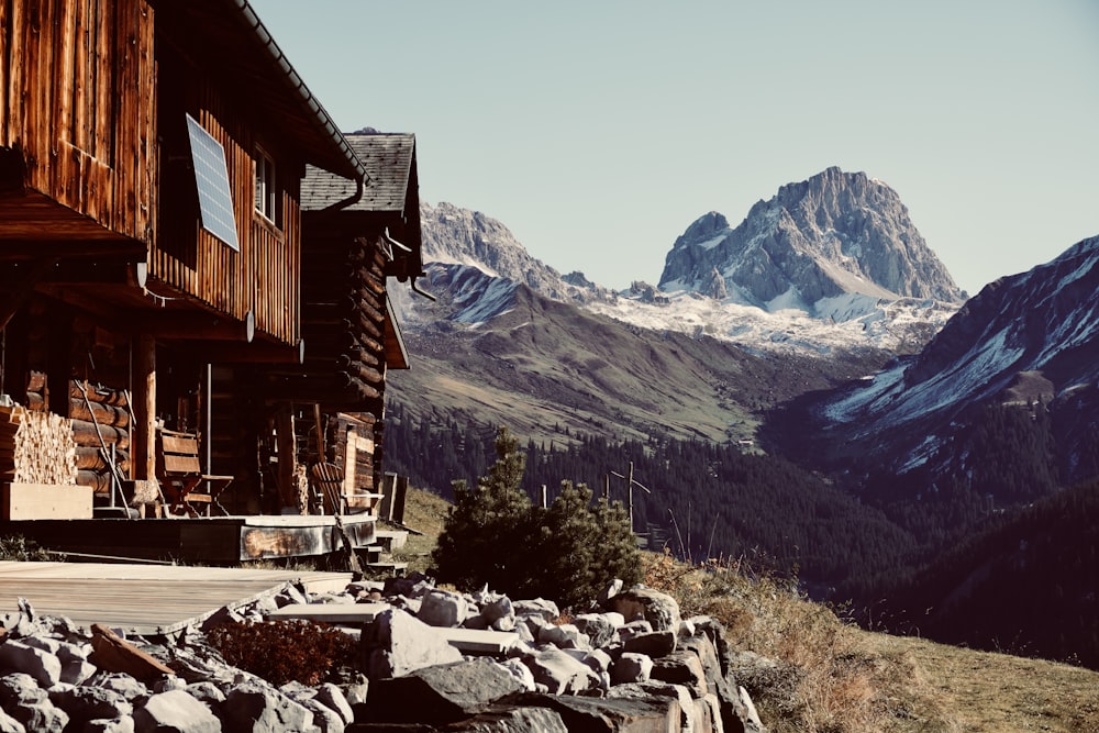 a house with a mountain in the background