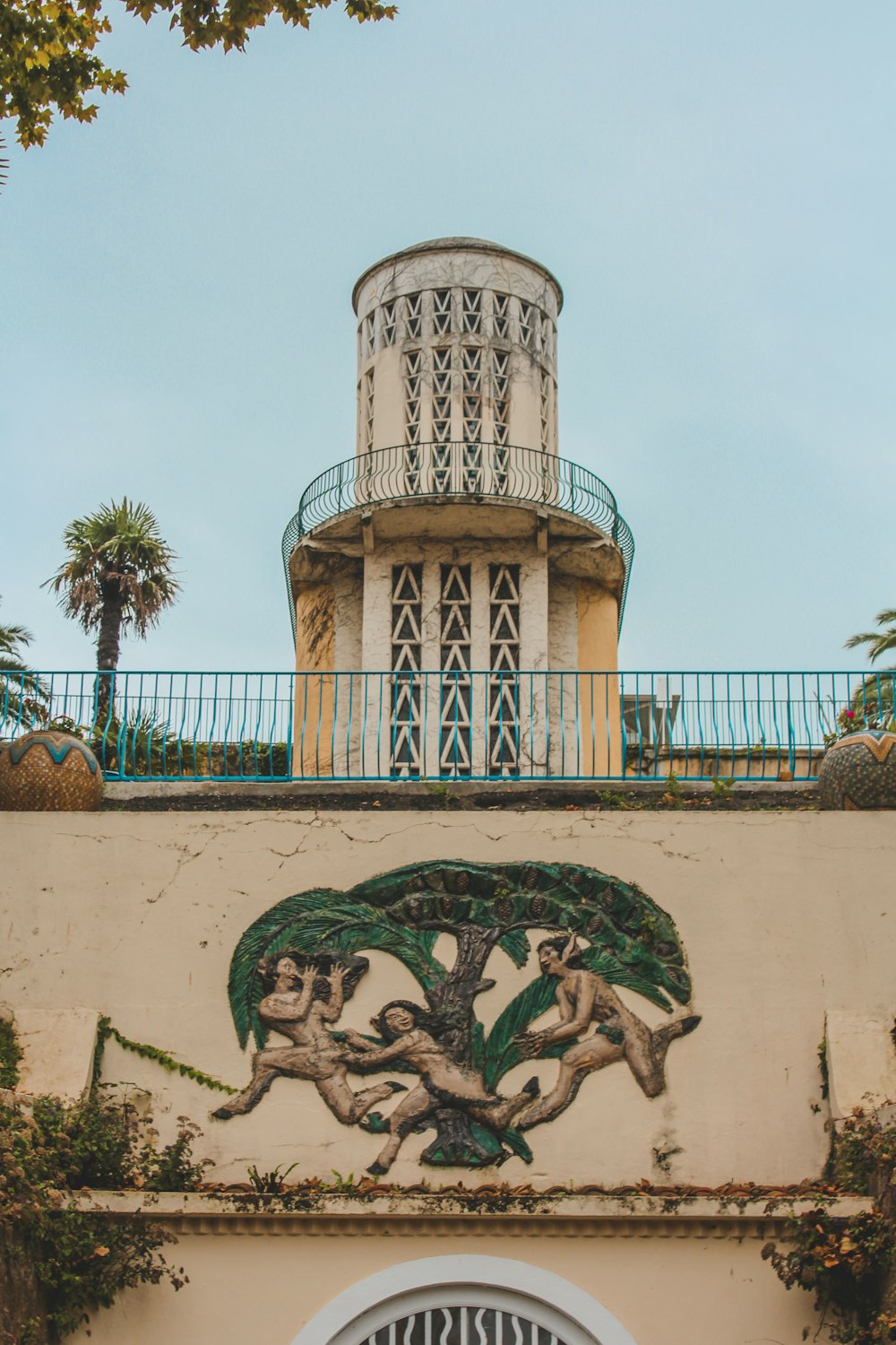 a tall building with a clock on the top of it