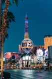 the eiffel tower in las vegas is lit up at night