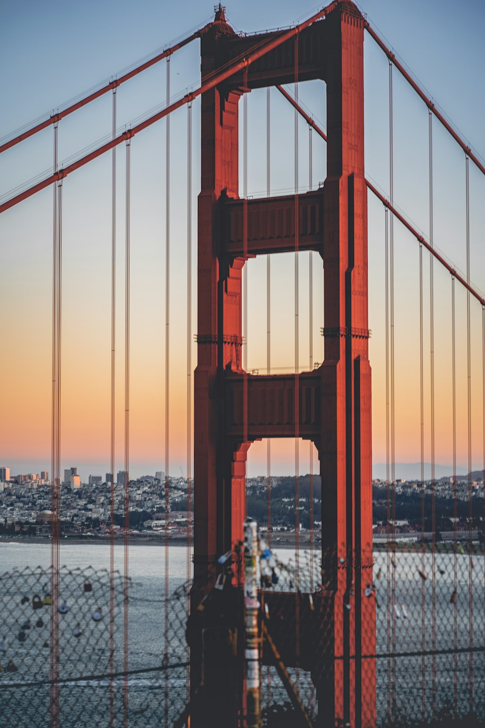 a view of the golden gate bridge at sunset