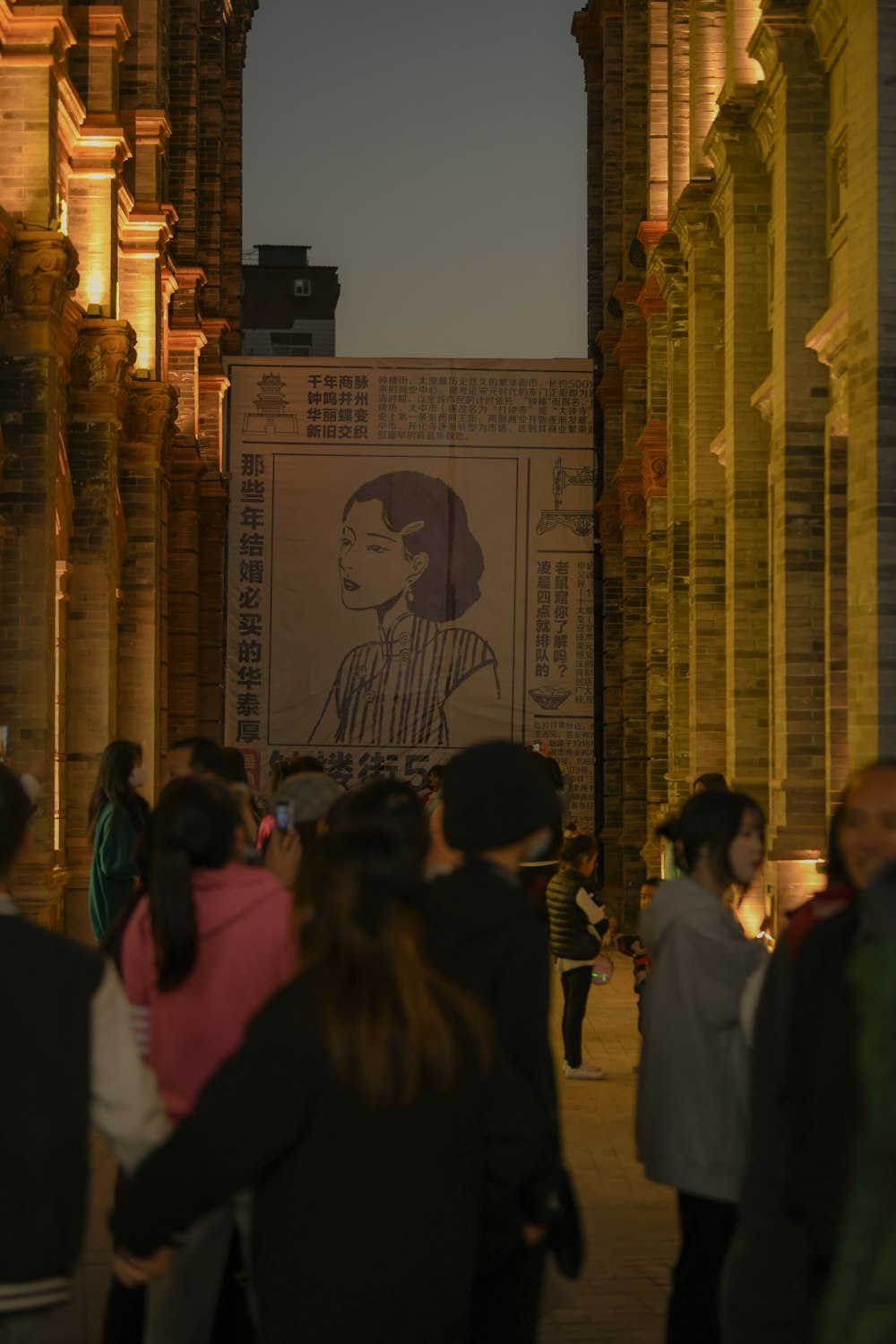 a group of people standing in front of a building