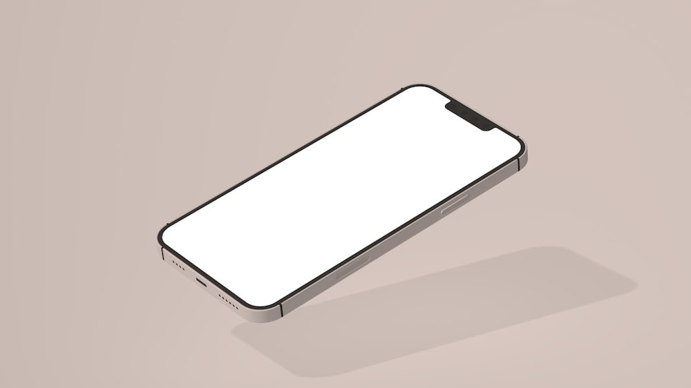 un teléfono celular blanco encima de una mesa