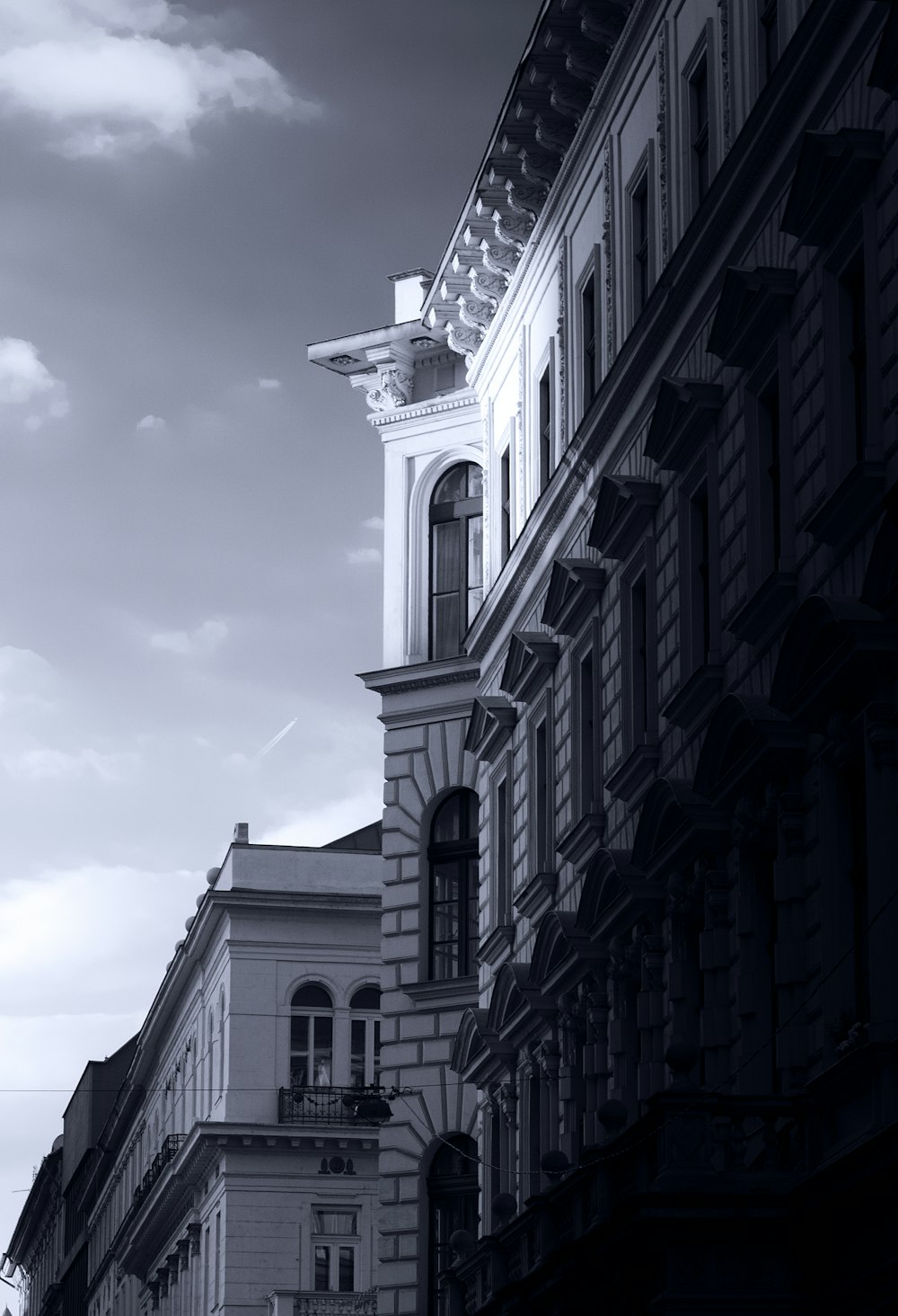 a black and white photo of a clock tower