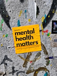 a yellow sign that reads your mental health matters