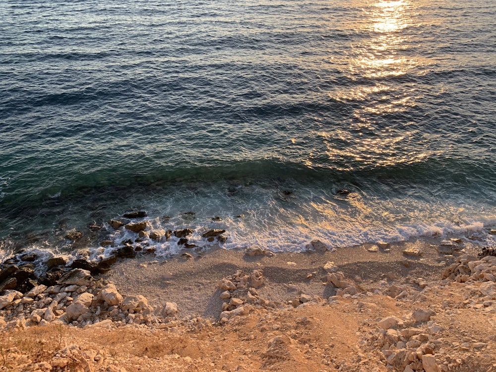 a view of a body of water from a cliff