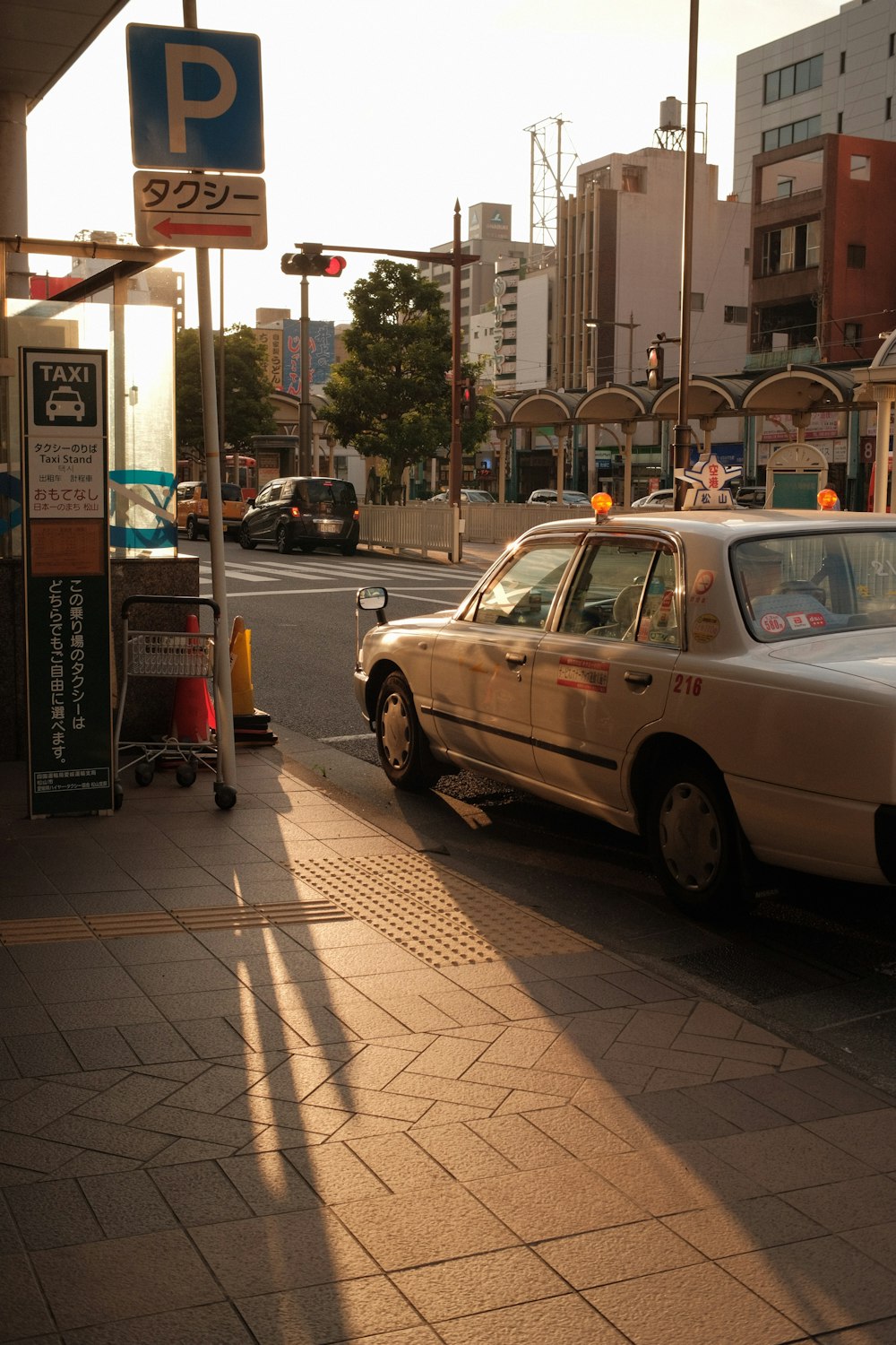 a car is parked on the side of the road