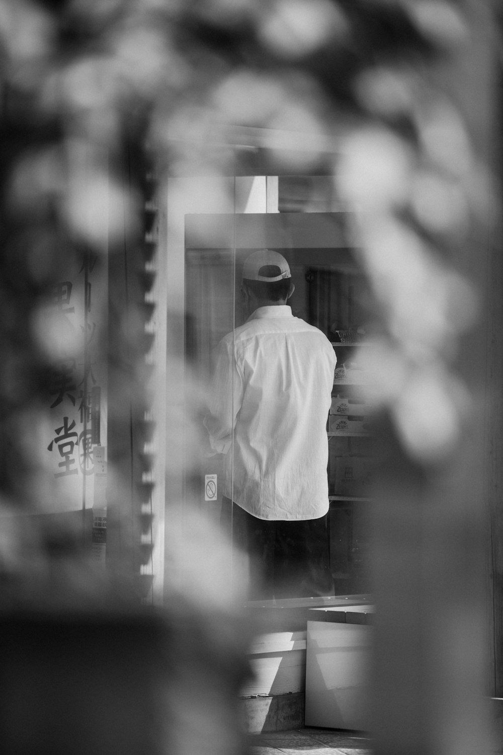 a man standing in front of a mirror