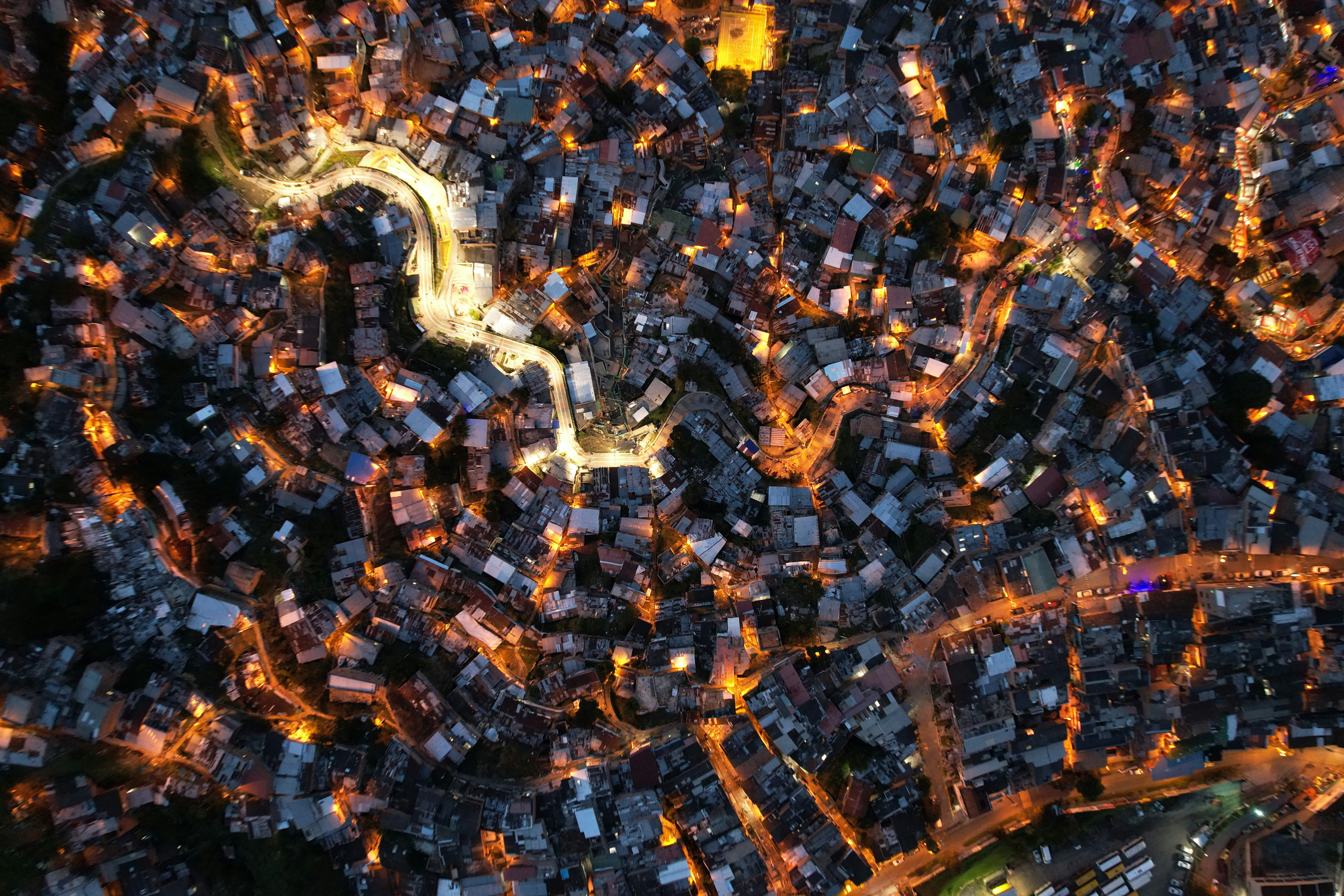an aerial view of a city at night