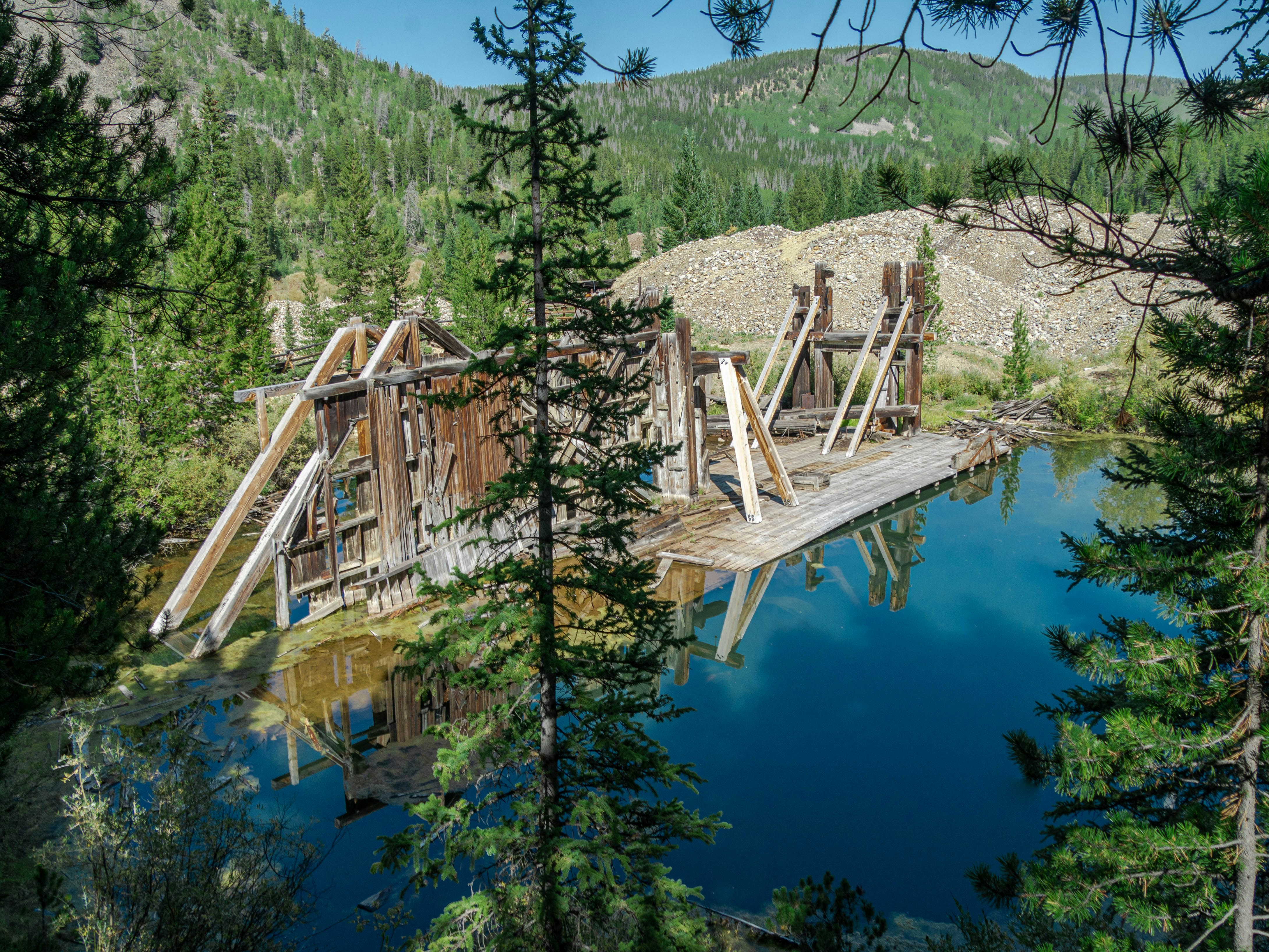 a wooden bridge over a body of water