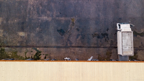 A truck parked at a loading dock.