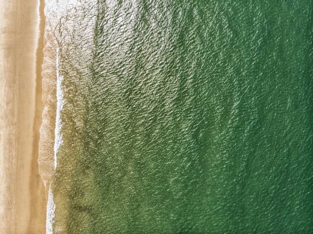 an aerial view of a beach and the ocean