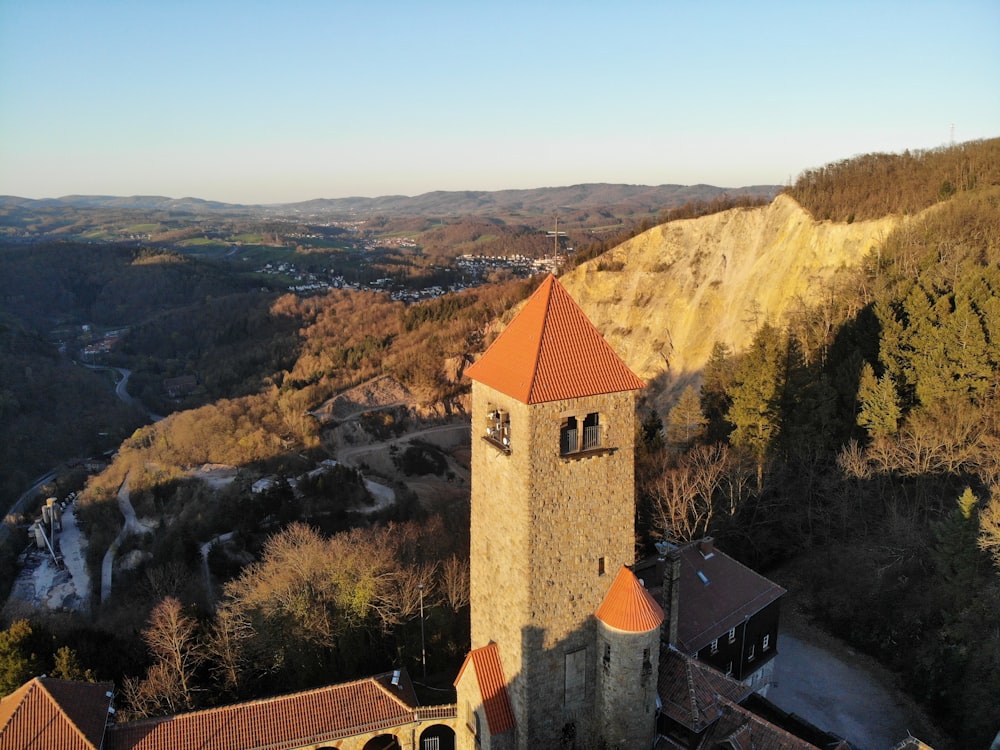 a tall tower with a clock on the top of it