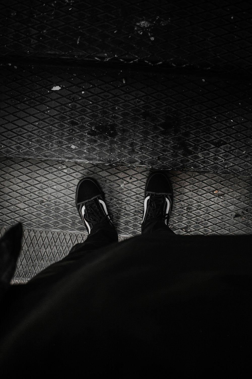 a person with their feet up on the ground