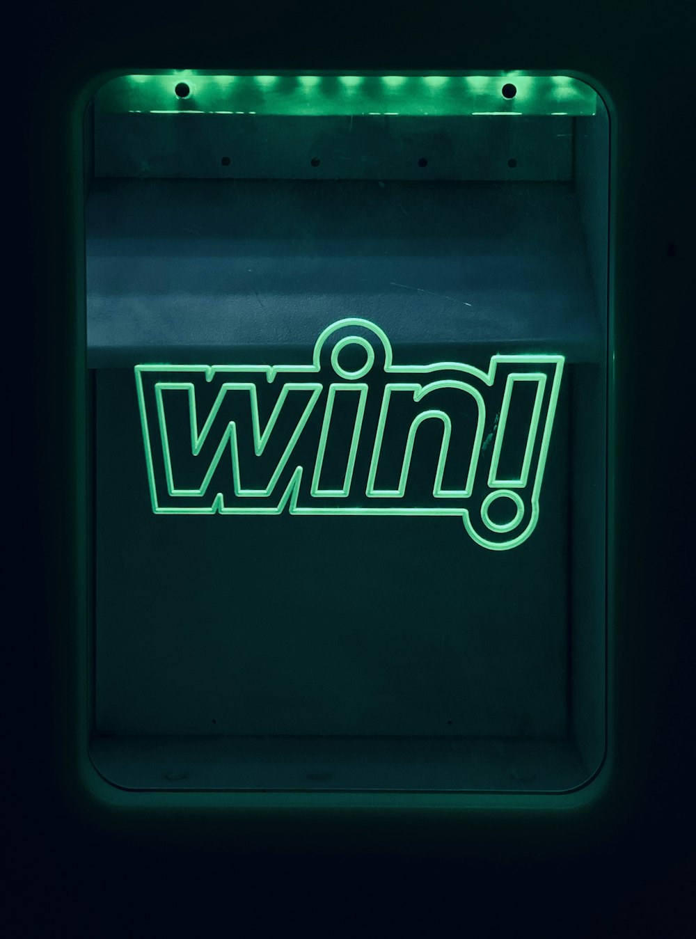 a neon sign with the word win on it