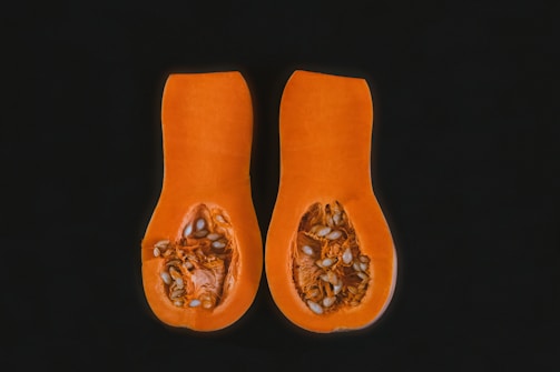 a couple of pieces of pumpkin sitting on top of a table