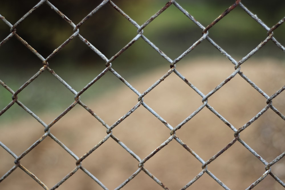 a close up of a chain link fence