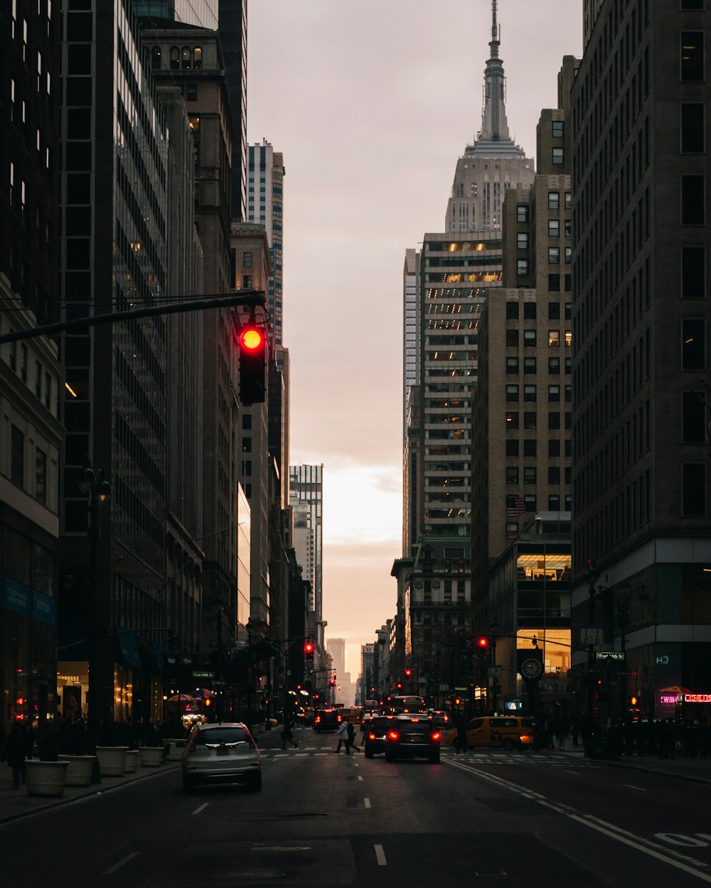 a city street filled with lots of tall buildings