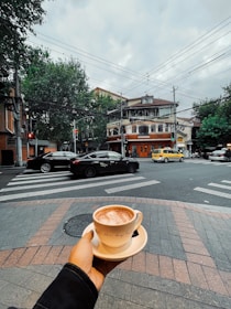 a cup of coffee sitting on top of a saucer