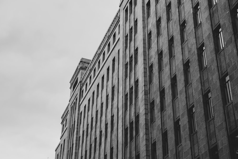 a black and white photo of a tall building