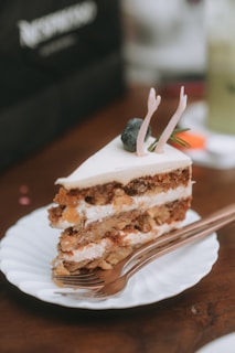 a piece of cake sitting on top of a white plate