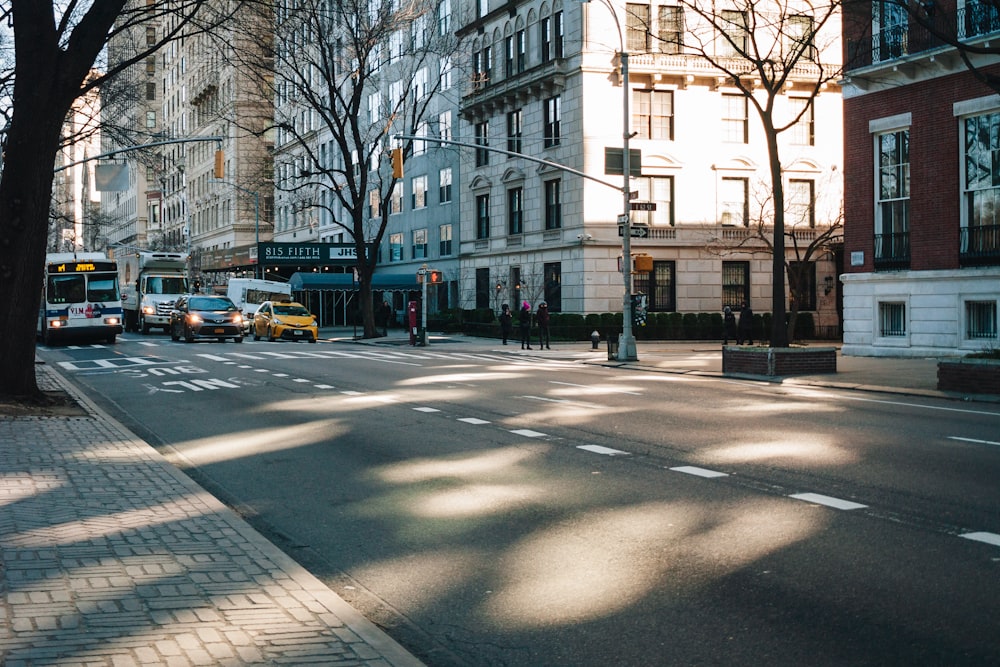 a city street filled with lots of tall buildings